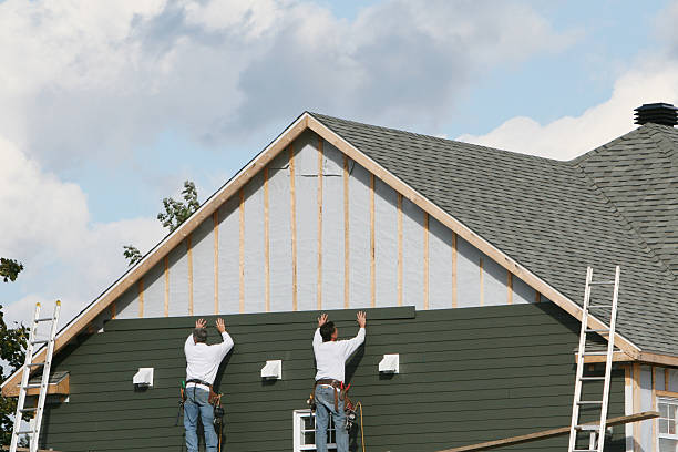 Professional Siding Installation technician working in Pineville, PA